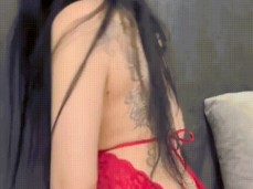 Hot milf in red lingerie flirts and shines her pussy gif