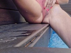 Wife rubbing her clit poolside gif