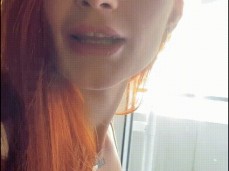 A lustful beauty quietly jerks off her shaved pink pussy gif