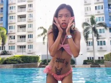 tiny asian at the pool gif