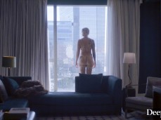 Kendra Sunderland stands in lingerie in front of hotel window gif