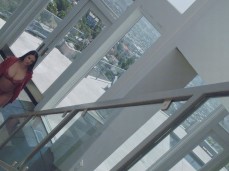 Angela White walking in leather jacket and sheer lingerie gif