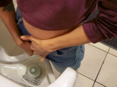 girl pissing in mens bathroom gif