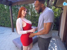 Redhead Lauren Phillips seducing Black stud in backyard gif