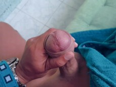 Horny guy in bathrobe strokes his hot, big-headed, uncut cock 0140-1 10 gif