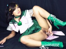 Sweet Momoka Koizumi in high heel boots plays with glass dildo gif