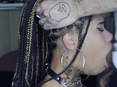 holding onto her braided pigtails as he pumps into her throat gif