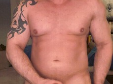 Buff, smooth, hobald, bearded Logan Packard strokes his hard cock, and cums gif