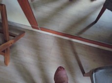 Fit guy walks to a mirror to look at his big, hard, uncut cock 0039-1 3 gif