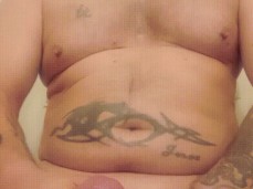 Beefy daddy Mickey Mesmereyes strokes his thick cock, dumps a big load gif