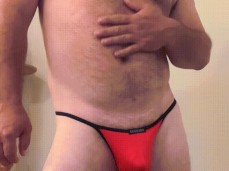 Burly, bearded, hairy dilf shows off his sexy body in a G-string 0012-1 10 gif