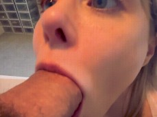 stuffing cock in blonde gf's mouth while reading a book in bed gif