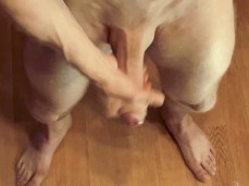 Hot, smooth, barefoot jock strokes his big, thick, uncut cock & cums a lot gif