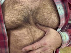 Only the boss is in, today; he unbuttoned his shirt and is touching himself gif