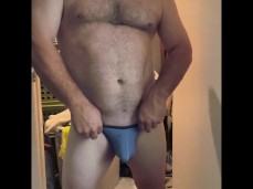 Stocky, hairy-chested, smooth-assed daddy bear shows off in sexy underwear gif
