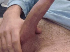 Stroking Huge Cock at the Office gif