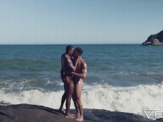 Jonatas & Markin Wolf kissing naked, cock to cock, on the rocks by the sea gif