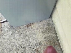 Horny jock in white socks strokes his big uncut cock outdoors and explodes gif