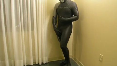 Completing the transformation as I change into orca predator wetsuit
