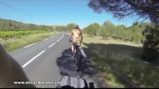 Nude in public biking on the road