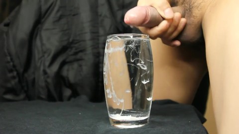 cumming in a glass of water