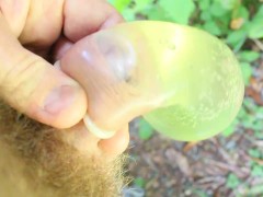 Hairy Guy Pees in a Condom, and makes a mess