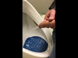 Dirty Boy Pissing in Dirty Urinal