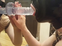 Amateur in Latex Hood Blowing a Dildo
