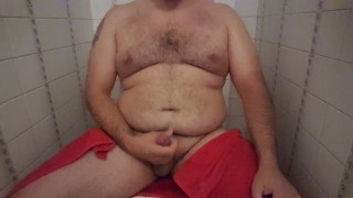 Bear jacking off in the toilets