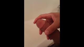 Masturbating over the bathroom tub