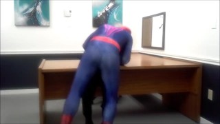 Spiderman Pounces On A Robber He Encounters In An Office