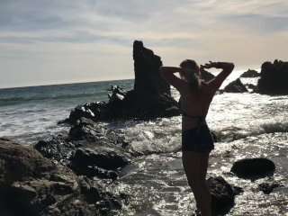 Model blows photographer on the beach and swallows cum