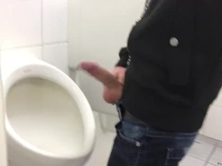 Gay Boy is Jerking off in Public Restroom and Shoot his Load in a Urinoir