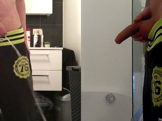 teen boy is urinating in the bathroom