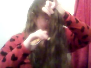 combing Long Curly Hair with a Wooden Comb