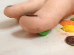 Crushing skittles barefoot
