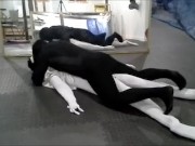 Preview 2 of black meshed frogman vs white spandex and spiderman dummy