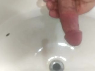 Jacking off into the Sink