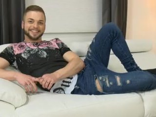 Koby Lewis shows off his ripped abs