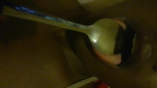 Licking a spoon..lol