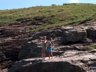 Two hot lesbian girls on the sea rocks