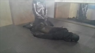 skeleton wearing a wetsuit