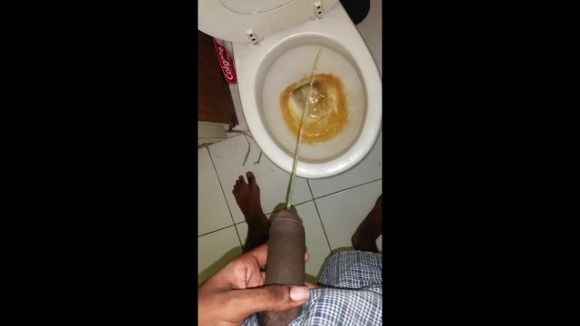 Black teen boy pissing