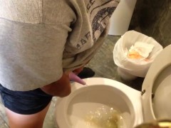 Having a blast taking a leak with the go girl penis!