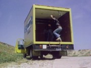 Preview 1 of Sexy young woman takes two big dicks on a truck