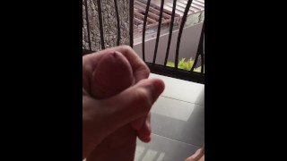 Masturbating on the balcony