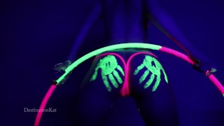 Under A Black Light Destinationkat Performs Hula Hoops And Dances