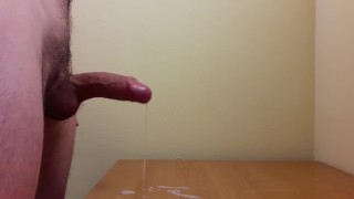 On The Desk There Is An Uncut Dick Cumshot