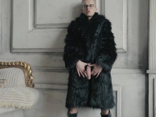 Blond twink boy nude in fur coat shows his long uncut cock