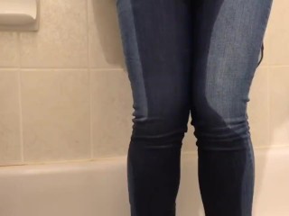 Screen Capture of Video Titled: Girl pees pants then cums